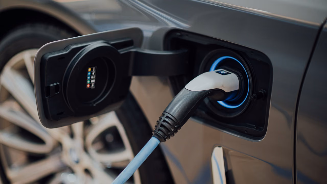Charging cable plugged into the charging port of an electric car